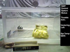 Prototype 003a in vacuum chamber with telemetry overlay